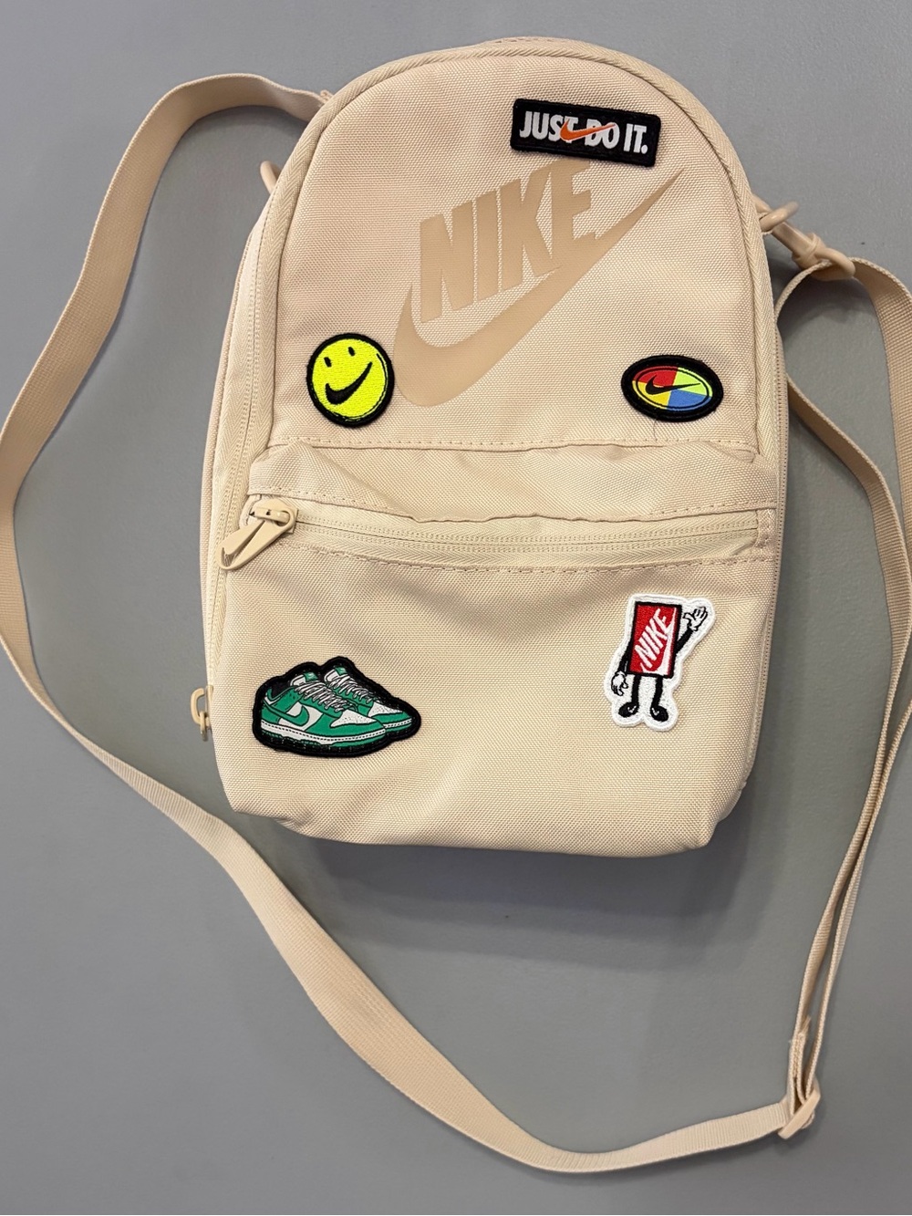 Nike Beige LunchBox with Patch Accents
